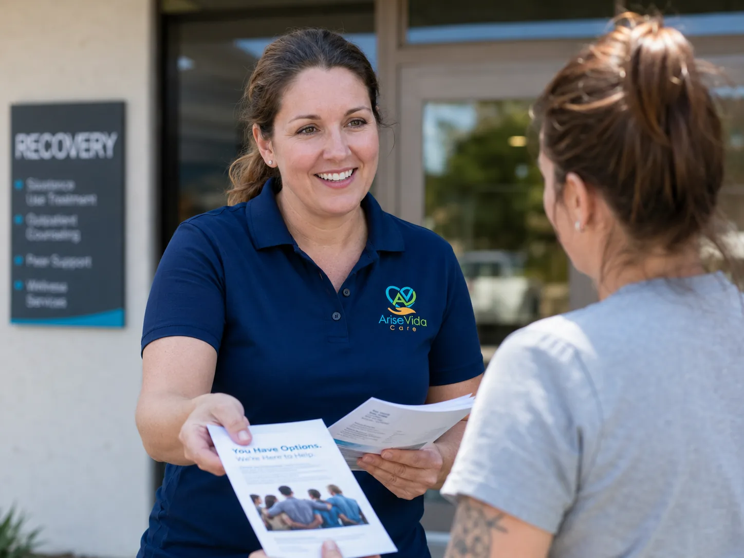 AriseVida Care team member speaking with a person about treatment options